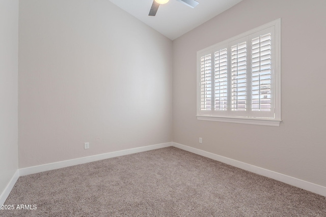 1062 N Robin Ln, Mesa, AZ 85213 - spare room featuring carpet floors, ceiling fan, vaulted ceiling, and baseboards