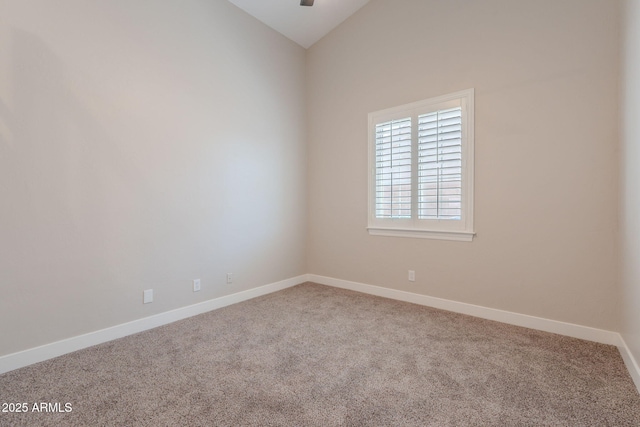 1062 N Robin Ln, Mesa, AZ 85213 - spare room with carpet, baseboards, and lofted ceiling