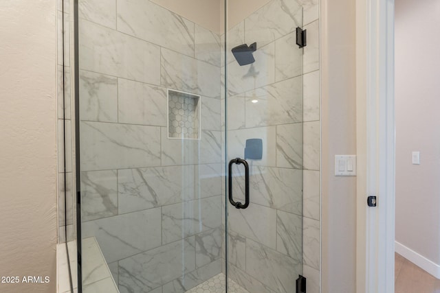 1062 N Robin Ln, Mesa, AZ 85213 - full bathroom featuring a stall shower and baseboards
