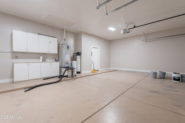 1062 N Robin Ln, Mesa, AZ 85213 - garage featuring gas water heater, a garage door opener, and baseboards