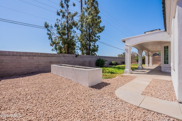 1062 N Robin Ln, Mesa, AZ 85213 - fenced backyard featuring a patio area