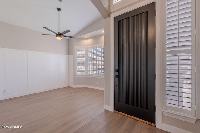 1062 N Robin Ln, Mesa, AZ 85213 - foyer with wood finished floors, vaulted ceiling, ceiling fan, and wainscoting