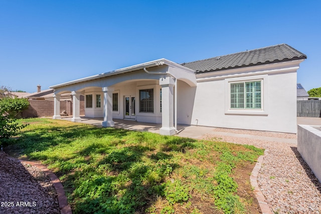 1062 N Robin Ln, Mesa, AZ 85213 - back of property with a tile roof, stucco siding, and a patio