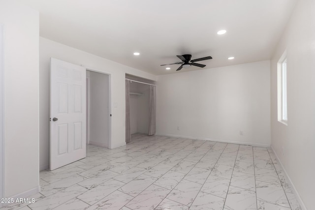 1644 W Mountain View Rd, Phoenix, AZ 85021 - unfurnished bedroom featuring recessed lighting, baseboards, light marble finish flooring, a closet, and ceiling fan