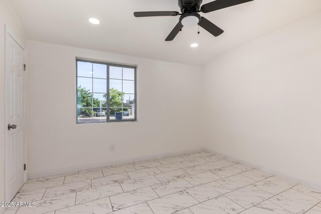 1644 W Mountain View Rd, Phoenix, AZ 85021 - unfurnished bedroom featuring recessed lighting, light marble finish floors, baseboards, and a ceiling fan