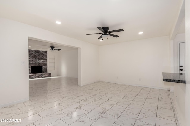 1644 W Mountain View Rd, Phoenix, AZ 85021 - unfurnished living room with a ceiling fan, recessed lighting, baseboards, and light marble finish flooring