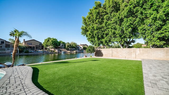 view of yard with a water view