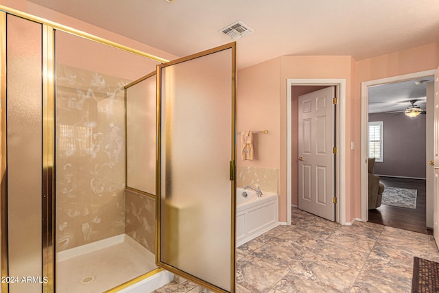 bathroom featuring separate shower and tub, ceiling fan, and hardwood / wood-style floors