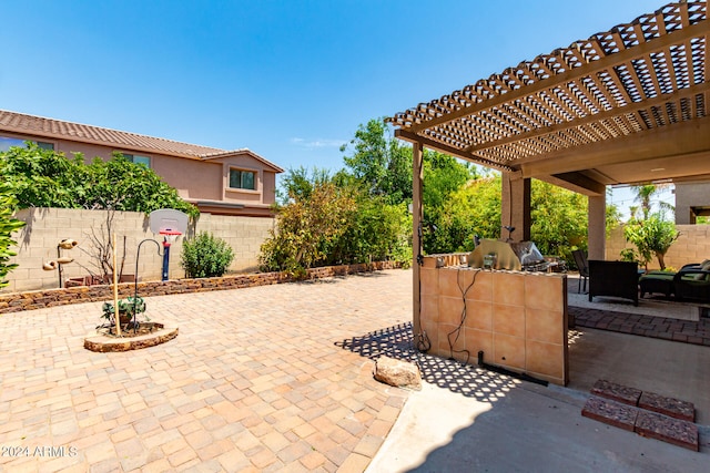 view of patio featuring a pergola