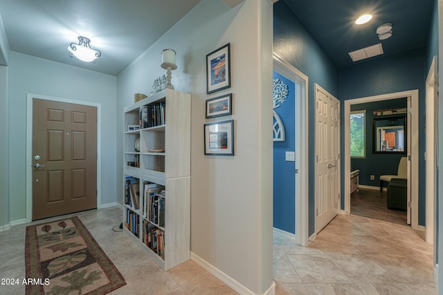 foyer entrance with baseboards