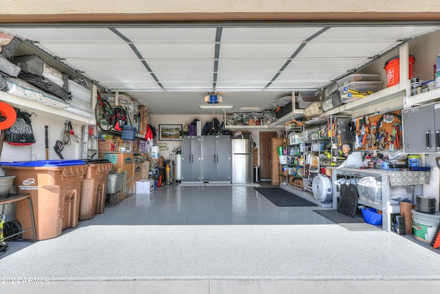 garage featuring freestanding refrigerator