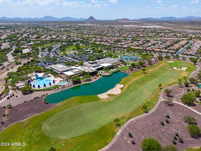 bird's eye view with view of golf course, a residential view, and a water and mountain view