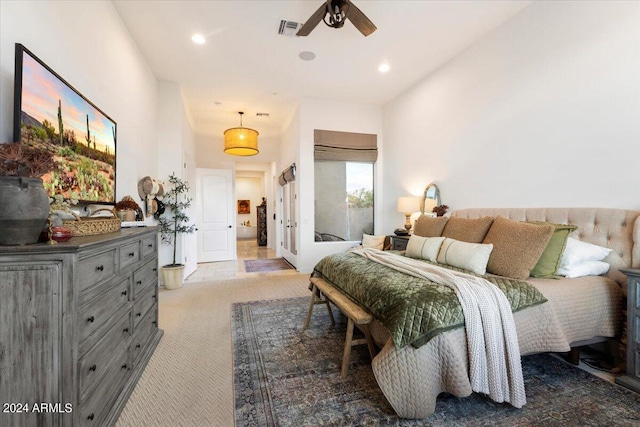 carpeted bedroom with ceiling fan