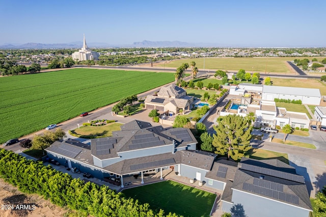 birds eye view of property featuring a mountain view