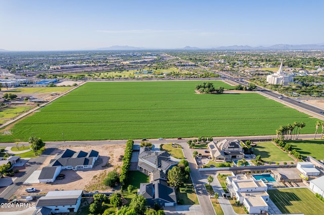 birds eye view of property featuring a mountain view