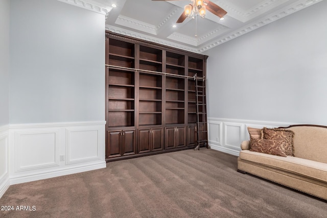 unfurnished room with crown molding, carpet, coffered ceiling, and ceiling fan