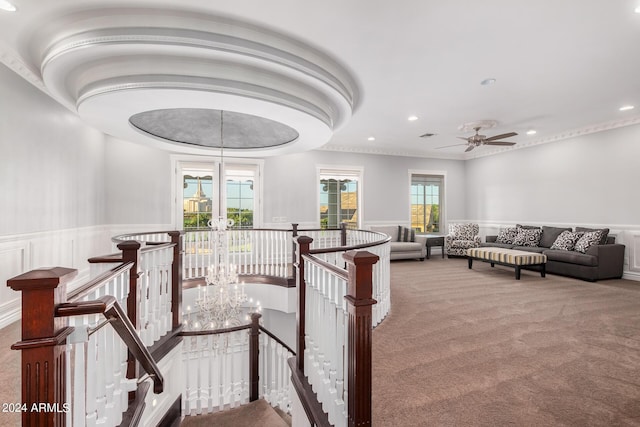 interior space featuring carpet and a notable chandelier