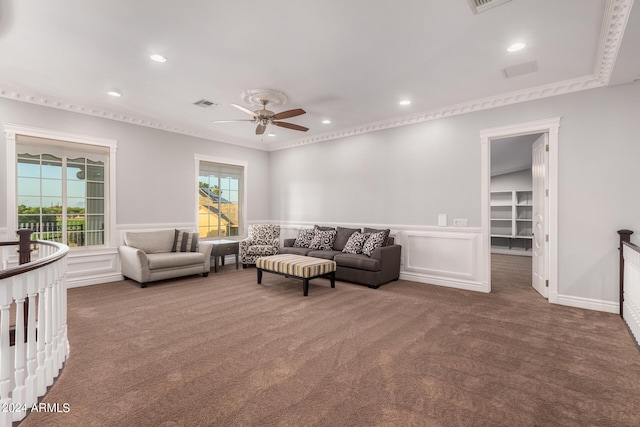 living room featuring carpet floors and ceiling fan