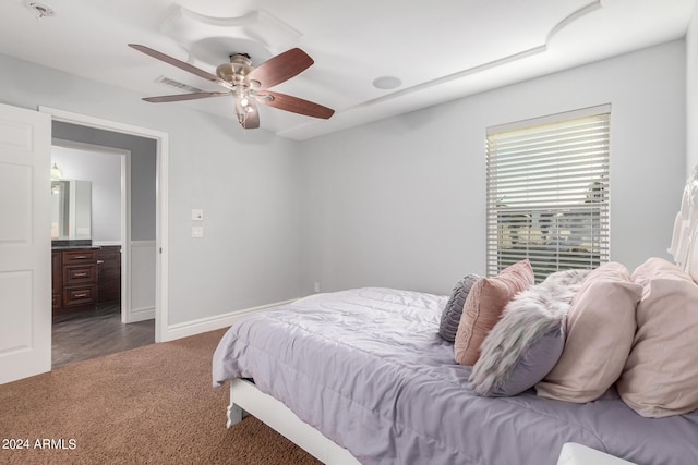 carpeted bedroom with ceiling fan