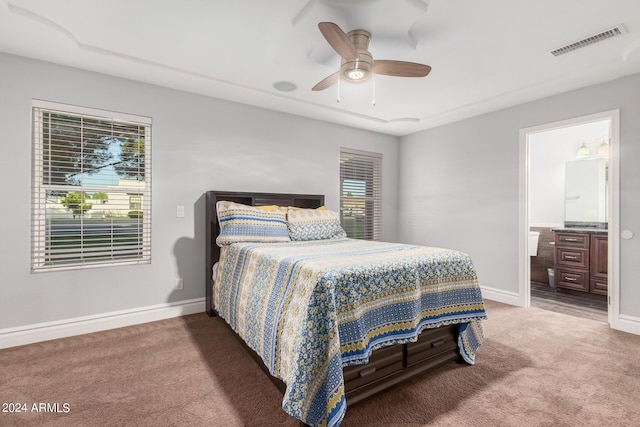 carpeted bedroom featuring ceiling fan and connected bathroom