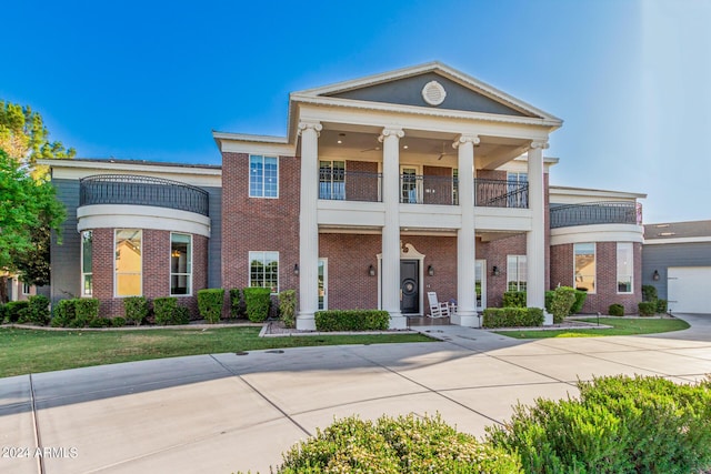 neoclassical / greek revival house with a balcony