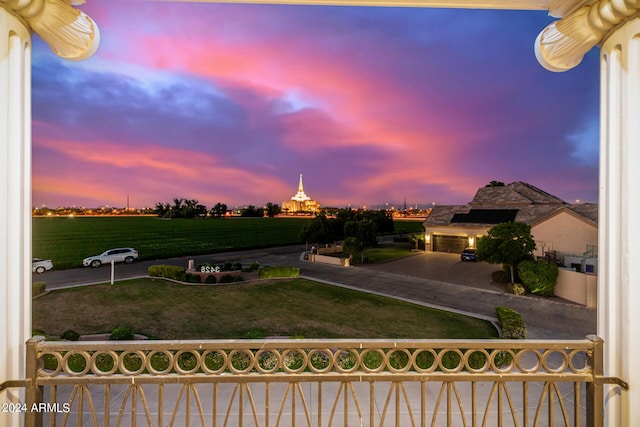 view of yard at dusk