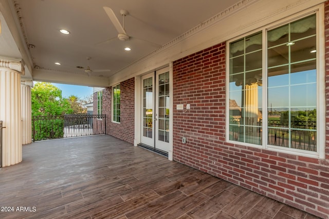 deck featuring a porch and ceiling fan