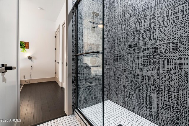 full bathroom with a shower stall