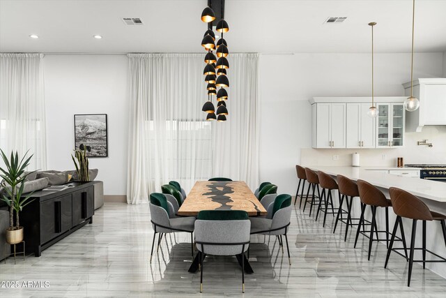 dining area with visible vents and recessed lighting