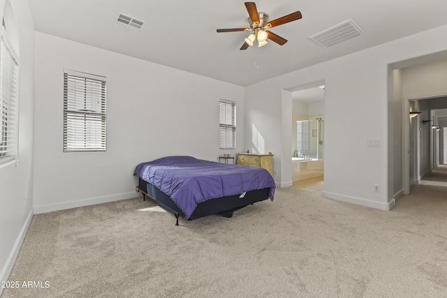 bedroom featuring carpet floors, baseboards, and visible vents