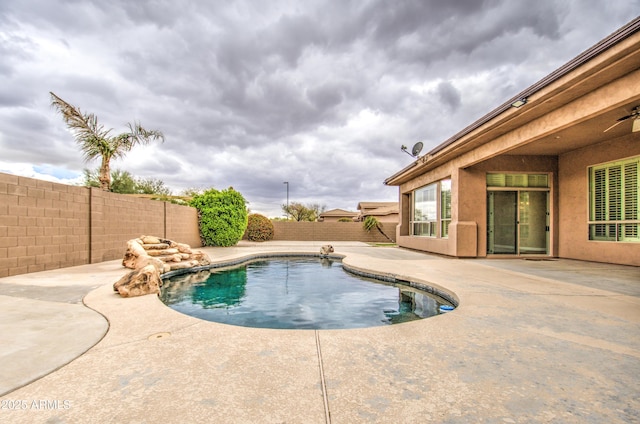 view of pool featuring a patio, a fenced backyard, and a fenced in pool