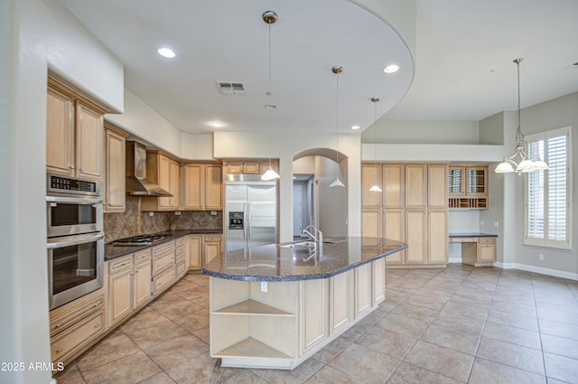 kitchen featuring open shelves, visible vents, appliances with stainless steel finishes, wall chimney exhaust hood, and tasteful backsplash