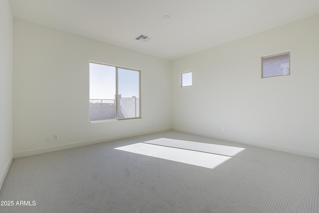 16367 W Desert Mirage Dr, Surprise, AZ 85388 - spare room featuring baseboards, visible vents, and carpet floors