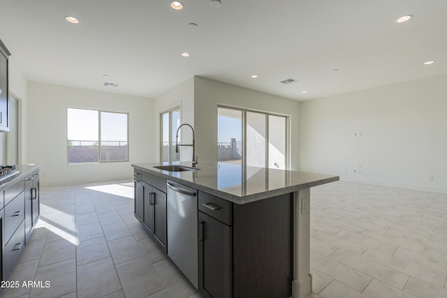 16367 W Desert Mirage Dr, Surprise, AZ 85388 - kitchen featuring recessed lighting, dishwasher, open floor plan, and a sink