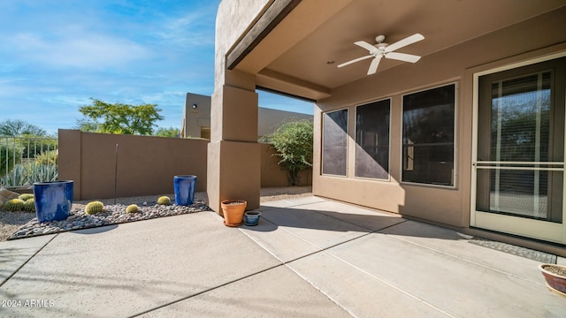 view of patio with ceiling fan