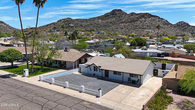 bird's eye view with a residential view and a mountain view