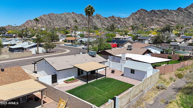 bird's eye view featuring a residential view and a mountain view