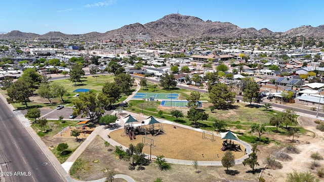 birds eye view of property featuring a mountain view and a residential view