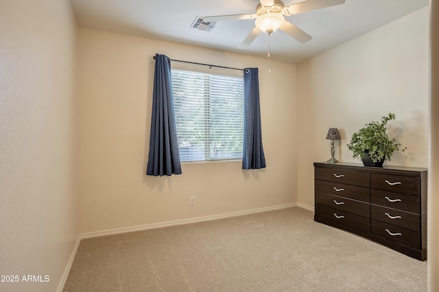 bedroom with light colored carpet, visible vents, and baseboards