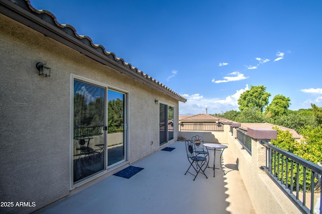 view of patio / terrace featuring a balcony