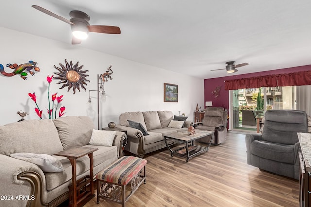 living room featuring light wood-type flooring and ceiling fan