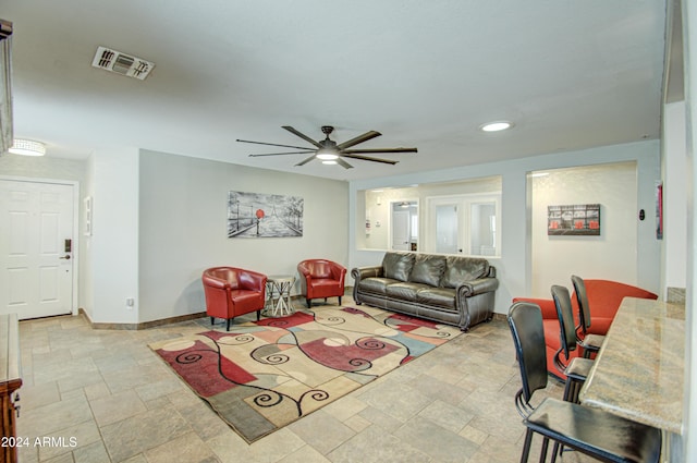 living room with ceiling fan