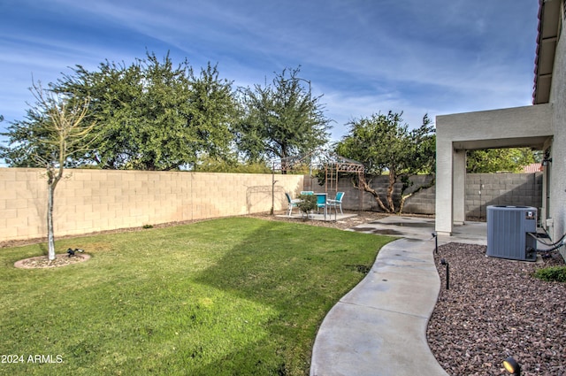 view of yard with a patio area and cooling unit