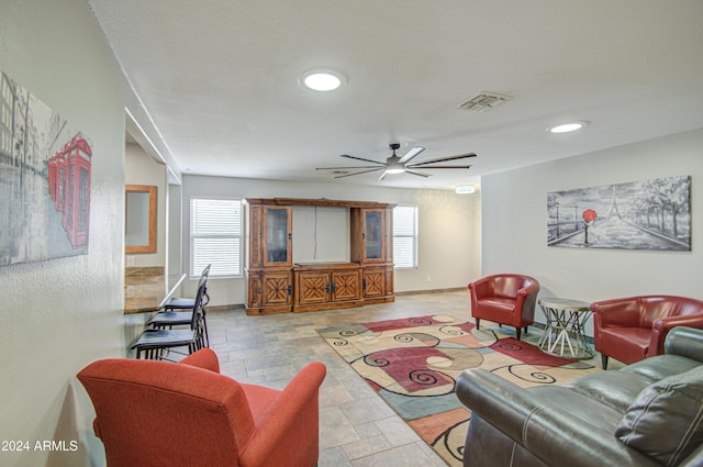 living room featuring ceiling fan