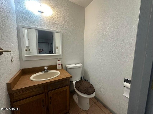 404 E Forest Dr, Payson, AZ 85541 - bathroom with tile patterned flooring, vanity, and a textured wall
