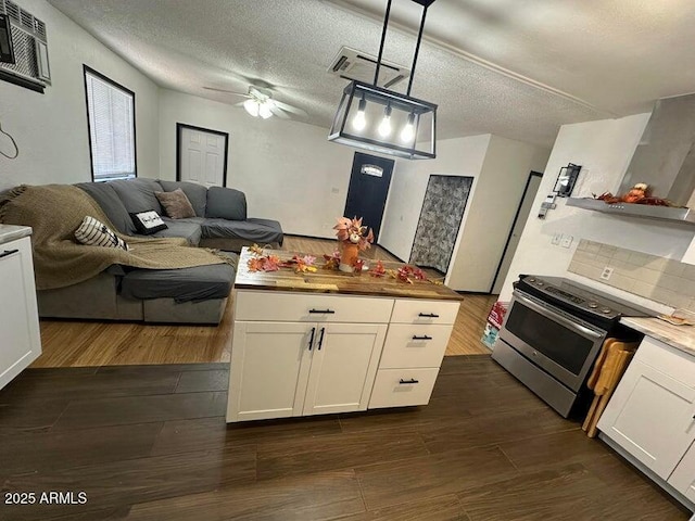 404 E Forest Dr, Payson, AZ 85541 - kitchen with stainless steel electric range, open floor plan, white cabinetry, ceiling fan, and dark wood-type flooring
