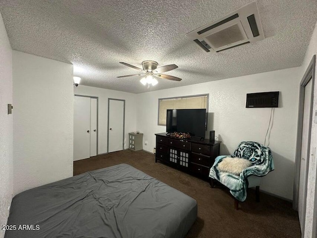 404 E Forest Dr, Payson, AZ 85541 - carpeted bedroom with two closets, a textured ceiling, ceiling fan, and a textured wall
