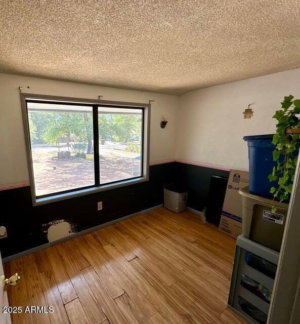 404 E Forest Dr, Payson, AZ 85541 - spare room with a textured ceiling and wood finished floors