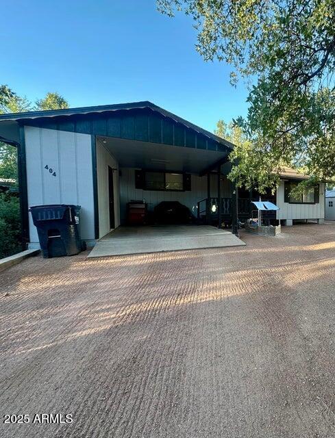 404 E Forest Dr, Payson, AZ 85541 - view of vehicle parking with an attached carport