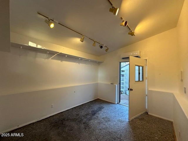 404 E Forest Dr, Payson, AZ 85541 - spare room with rail lighting and a wall mounted AC